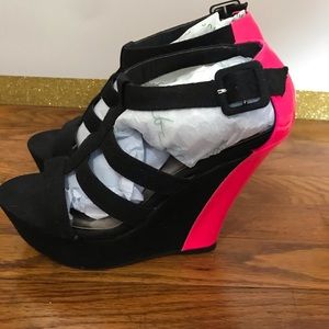 Black and hot pink wedges.